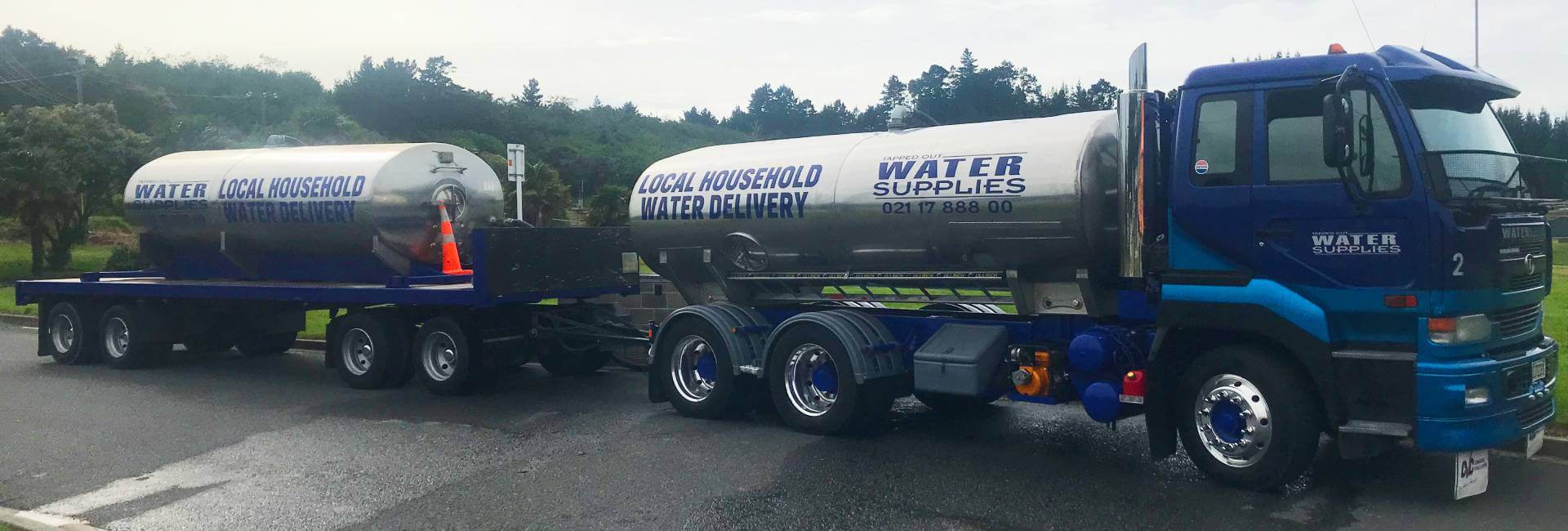 Tapped Out Water Supplies truck and trailer